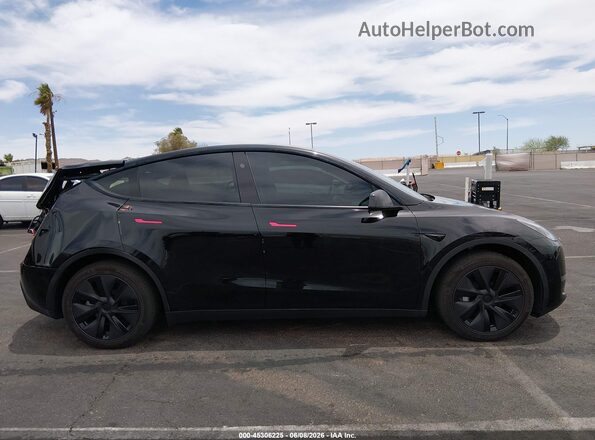 7SAYGDED9SF313878 2025 TESLA MODEL Y Black Rear interior view