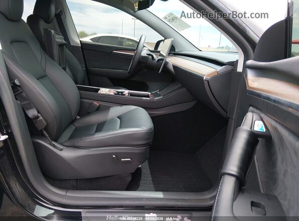7SAYGDED9SF313878 2025 TESLA MODEL Y Black Front interior view