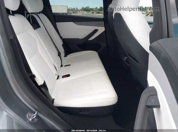 7SAYGDED9TF584280 2026 TESLA MODEL Y Gray Vista de la etiqueta del VIN