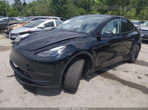 7SAYGDEDXPF941293 2023 TESLA MODEL Y Black წინა მარცხენა ხედი სამი მეოთხედიდან