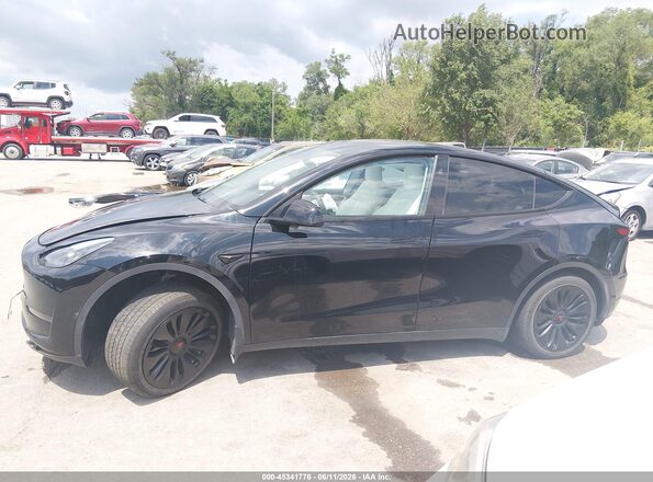 7SAYGDEDXPF941293 2023 TESLA MODEL Y Black უკანა სალონის ხედი