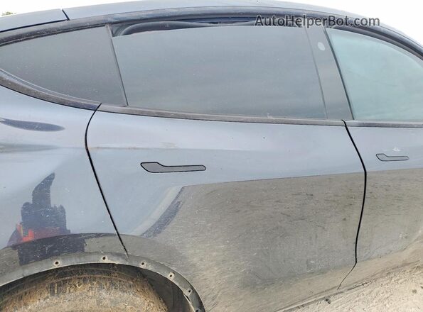 7SAYGDEDXRA331457 2024 TESLA MODEL Charcoal Vista de los asientos traseros