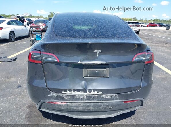 7SAYGDEDXSA377358 2025 TESLA MODEL Y Gray Widok wnętrza 360 stopni