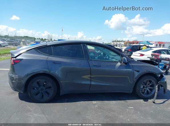 7SAYGDEDXSA377358 2025 TESLA MODEL Y Gray Widok deski rozdzielczej