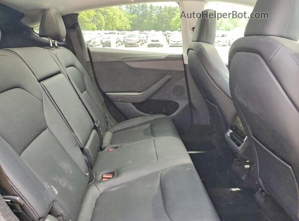 7SAYGDEDXTA457678 2026 TESLA MODEL Black Սալոնի հետևի տեսք