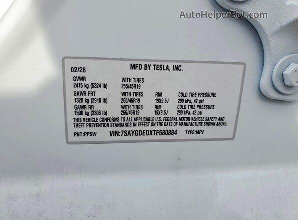 7SAYGDEDXTF580884 2026 TESLA MODEL White Вид наклейки з VIN-кодом