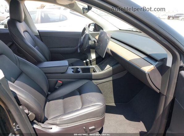 7SAYGDEE0NF411985 2022 TESLA MODEL Y Black Vista interior delantera