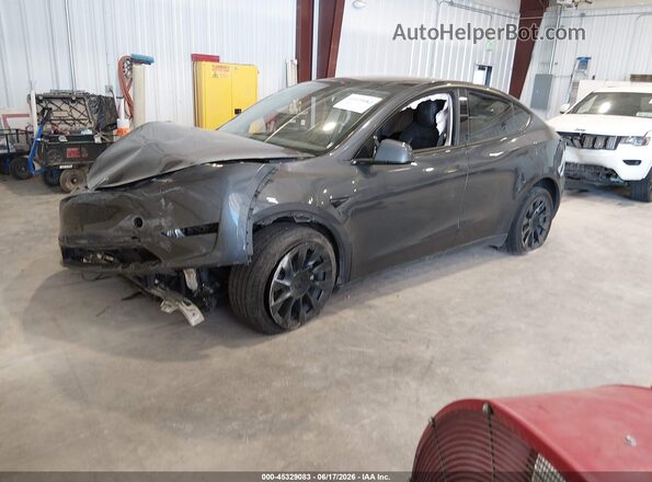 7SAYGDEE0PA045266 2023 TESLA MODEL Y Gray Vista tres cuartos delantera izquierda