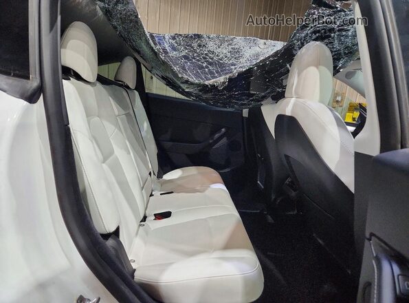 7SAYGDEE0PF614538 2023 TESLA MODEL White Rear seats view