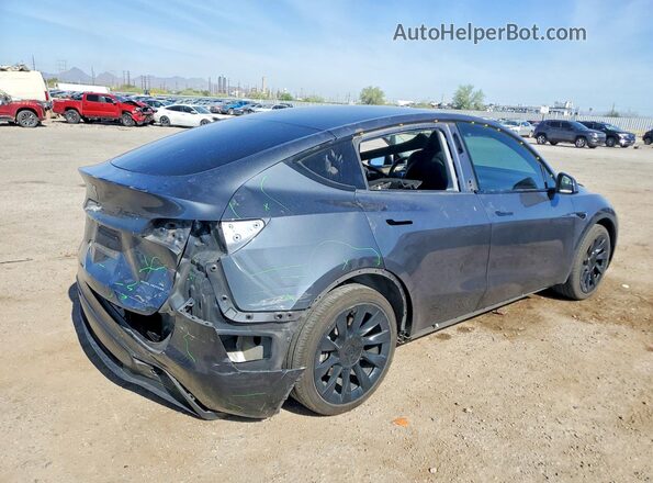 7SAYGDEE0PF860635 2023 TESLA MODEL Charcoal Trasero derecho