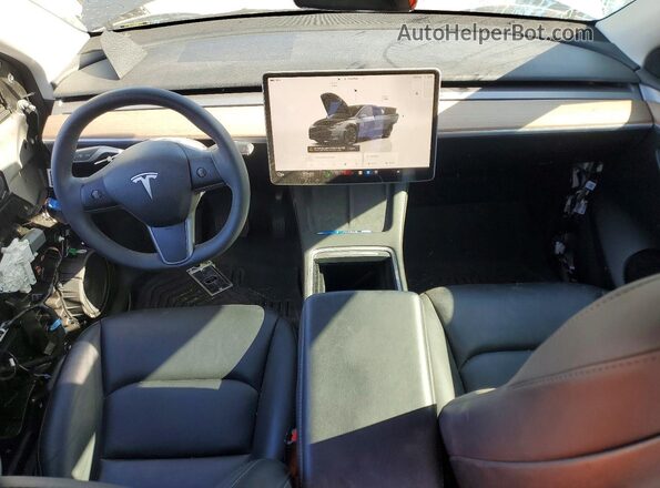 7SAYGDEE0PF860635 2023 TESLA MODEL Charcoal Vista del salpicadero