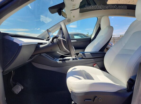 7SAYGDEE0PF957494 2023 TESLA MODEL Gray Front interior view