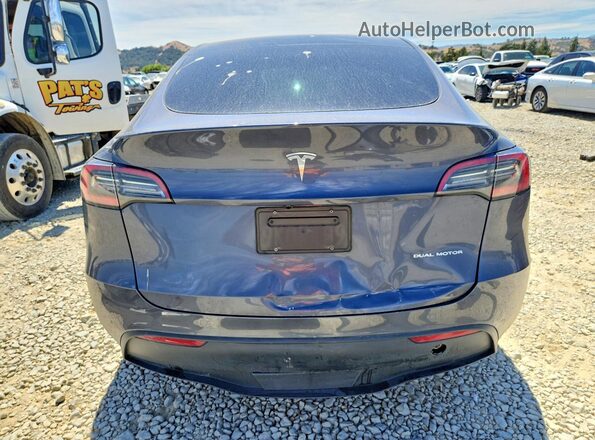 7SAYGDEE0PF957494 2023 TESLA MODEL Gray Rear view