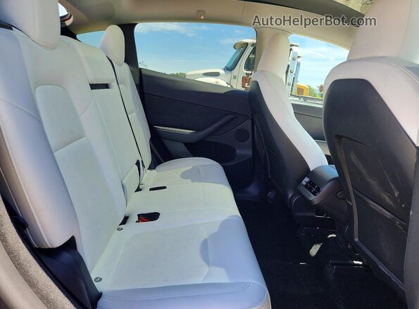 7SAYGDEE0PF957494 2023 TESLA MODEL Gray Rear seats view