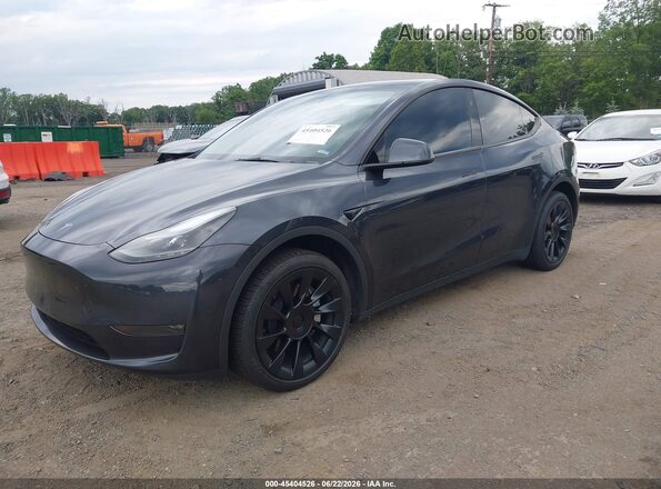 7SAYGDEE0RA281645 2024 TESLA MODEL Y Gray Front left