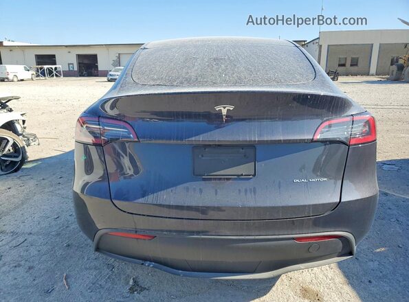 7SAYGDEE0RF195836 2024 TESLA MODEL Gray Rear view