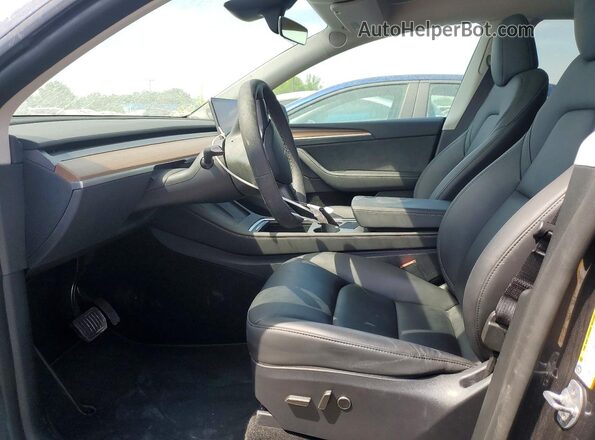 7SAYGDEE0RF195836 2024 TESLA MODEL Gray Front interior view