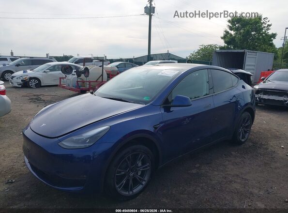 7SAYGDEE0SA337959 2025 TESLA MODEL Y Blue წინა მარცხენა ხედი სამი მეოთხედიდან