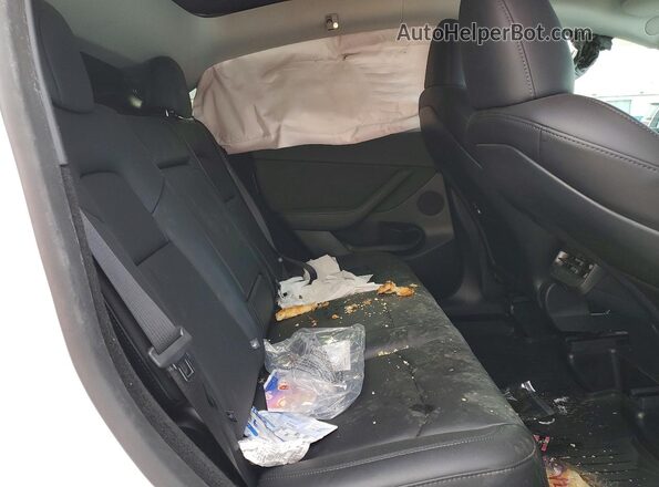 7SAYGDEE0SF267799 2025 TESLA MODEL White Սալոնի հետևի տեսք