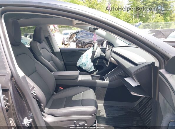 7SAYGDEE0TA585095 2026 TESLA MODEL Y Gray Front interior view
