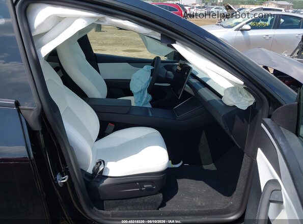 7SAYGDEE0TA637311 2026 TESLA MODEL Y Black Front interior view