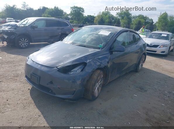 7SAYGDEE1PA092029 2023 TESLA MODEL Y Gray Առջևի ձախ երեք քառորդ տեսարան