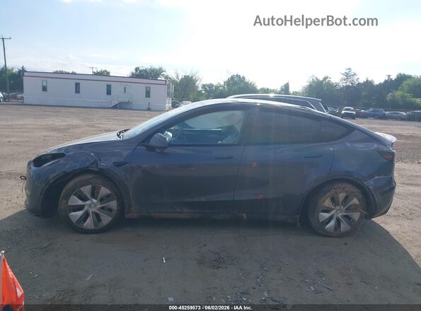 7SAYGDEE1PA092029 2023 TESLA MODEL Y Gray Սալոնի հետևի տեսք