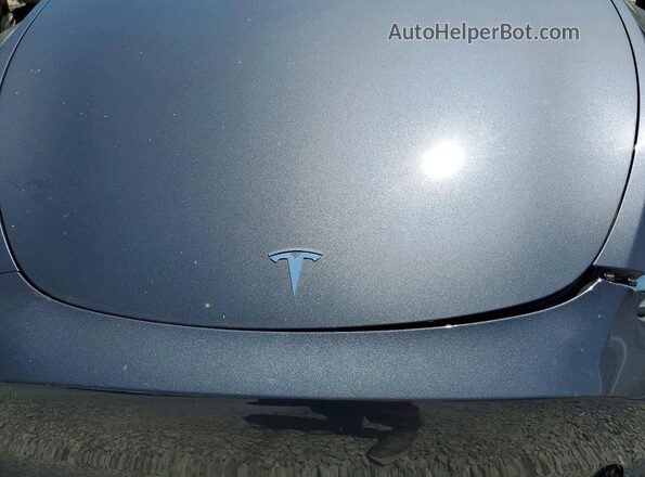 7SAYGDEE1PA136725 2023 TESLA MODEL Charcoal Rear interior view