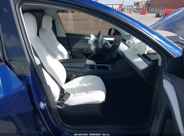 7SAYGDEE1PF616184 2023 TESLA MODEL Y Blue Front interior view
