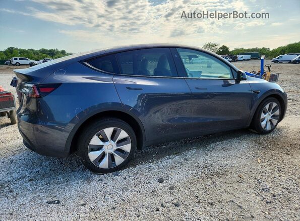 7SAYGDEE1PF911141 2023 TESLA MODEL Gray Trasero derecho