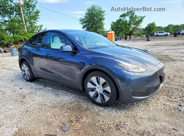 7SAYGDEE1PF911141 2023 TESLA MODEL Gray Delantero derecho