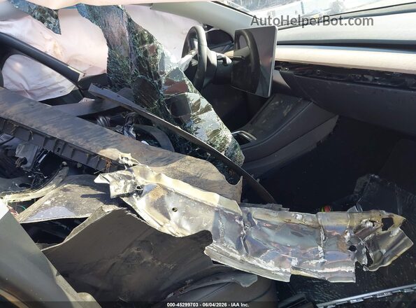 7SAYGDEE1RA233359 2024 TESLA MODEL Y Серый Вид салона спереди