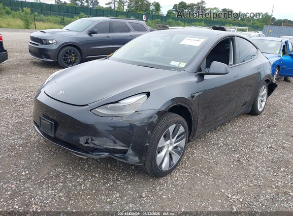 7SAYGDEE1RA273618 2024 TESLA MODEL Y Black წინა მარცხენა ხედი სამი მეოთხედიდან