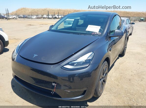 7SAYGDEE1SF318310 2025 TESLA MODEL Y Gray Przód lewy