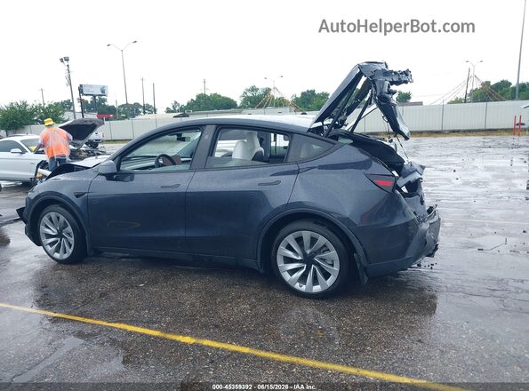 7SAYGDEE1TA466407 2026 TESLA MODEL Y Gray Widok wnętrza z tyłu