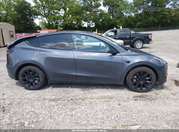 7SAYGDEE2NA006563 2022 TESLA MODEL Y Gray Widok wnętrza z tyłu