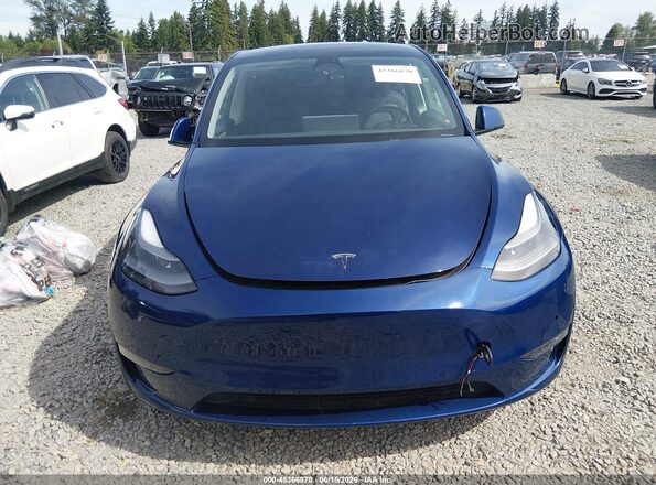7SAYGDEE2NF558941 2022 TESLA MODEL Y Blue Սալոնի հետևի տեսք