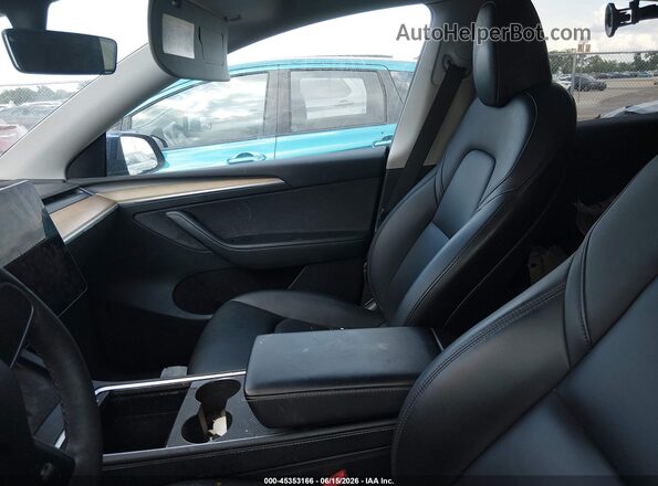 7SAYGDEE2PA054115 2023 TESLA MODEL Y Blue Rear interior view