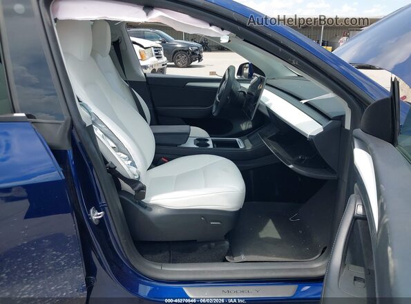 7SAYGDEE2PA118296 2023 TESLA MODEL Y Синий Вид салона спереди