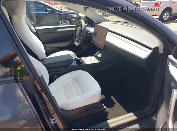 7SAYGDEE2PF692514 2023 TESLA MODEL Y Gray Vista interior delantera