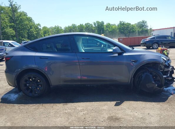 7SAYGDEE2PF692514 2023 TESLA MODEL Y Gray Vista interior trasera
