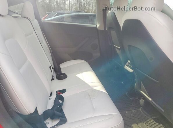7SAYGDEE2PF761685 2023 TESLA MODEL Red Rear seats view