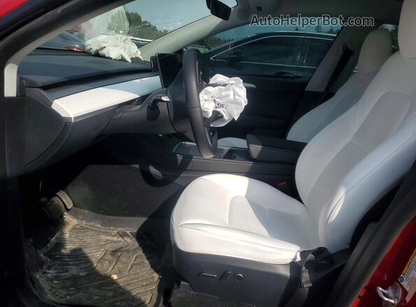 7SAYGDEE2PF761685 2023 TESLA MODEL Red Front interior view