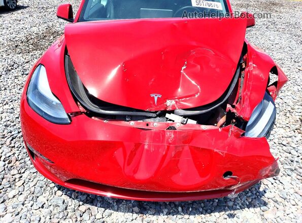 7SAYGDEE2PF766482 2023 TESLA MODEL Red Rear interior view