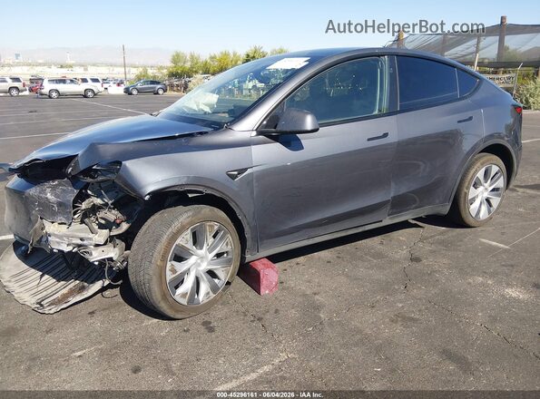 7SAYGDEE2PF923928 2023 TESLA MODEL Y Gray წინა მარცხენა ხედი სამი მეოთხედიდან