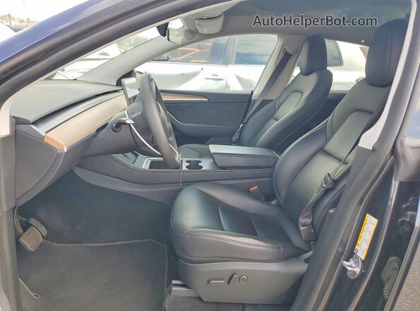 7SAYGDEE2RA245942 2024 TESLA MODEL Charcoal Вид салону спереду