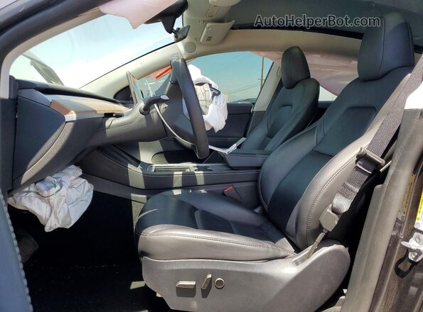 7SAYGDEE2RF089727 2024 TESLA MODEL Серый Вид салона спереди