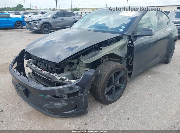 7SAYGDEE2TA414770 2026 TESLA MODEL Y Black Առջևի ձախ երեք քառորդ տեսարան