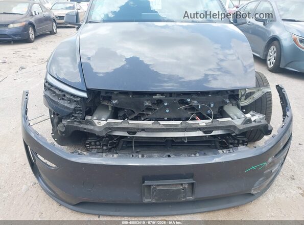 7SAYGDEE2TA414770 2026 TESLA MODEL Y Black Սալոնի հետևի տեսք