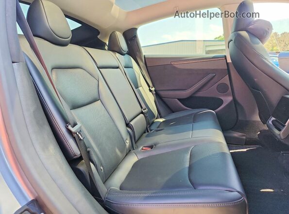 7SAYGDEE2TF326191 2026 TESLA MODEL Silver Rear interior view
